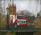 old bus crossing the river