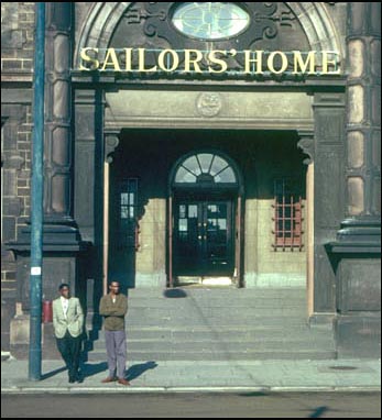coloured sailors outside the home